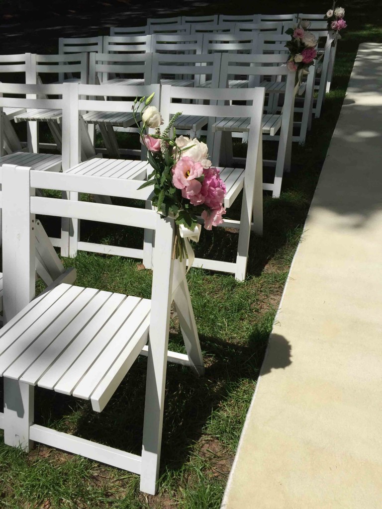 White wooden chairs Weddings Of Distinction