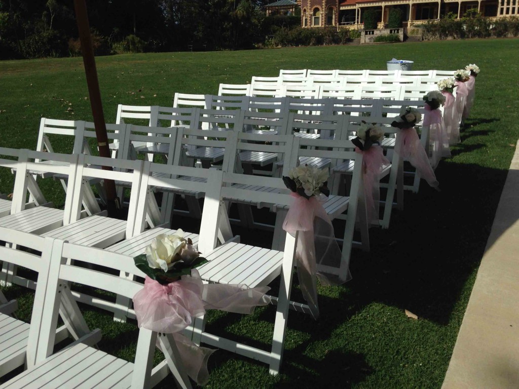 White wooden chairs Weddings Of Distinction
