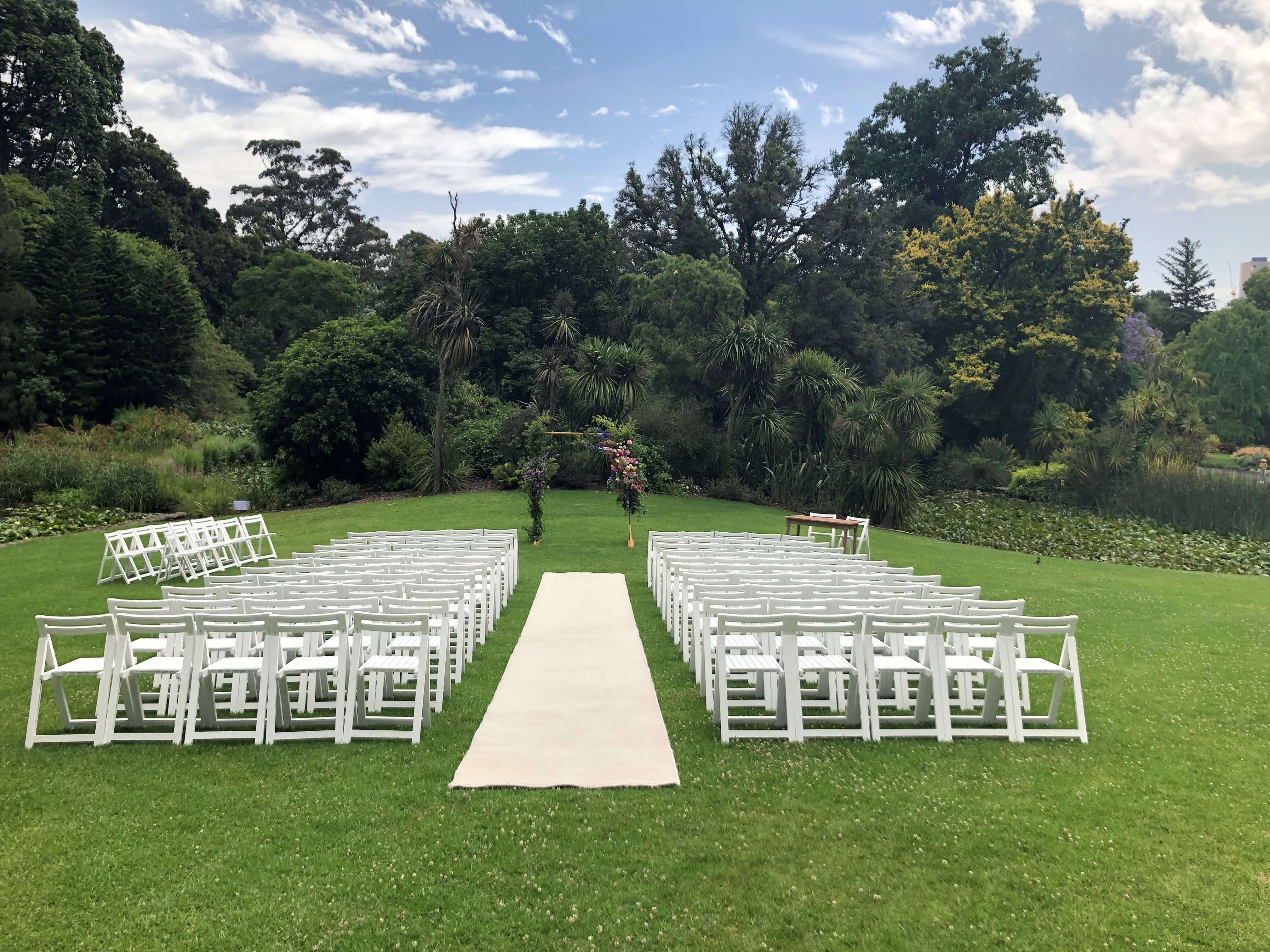 White wooden chairs Weddings Of Distinction