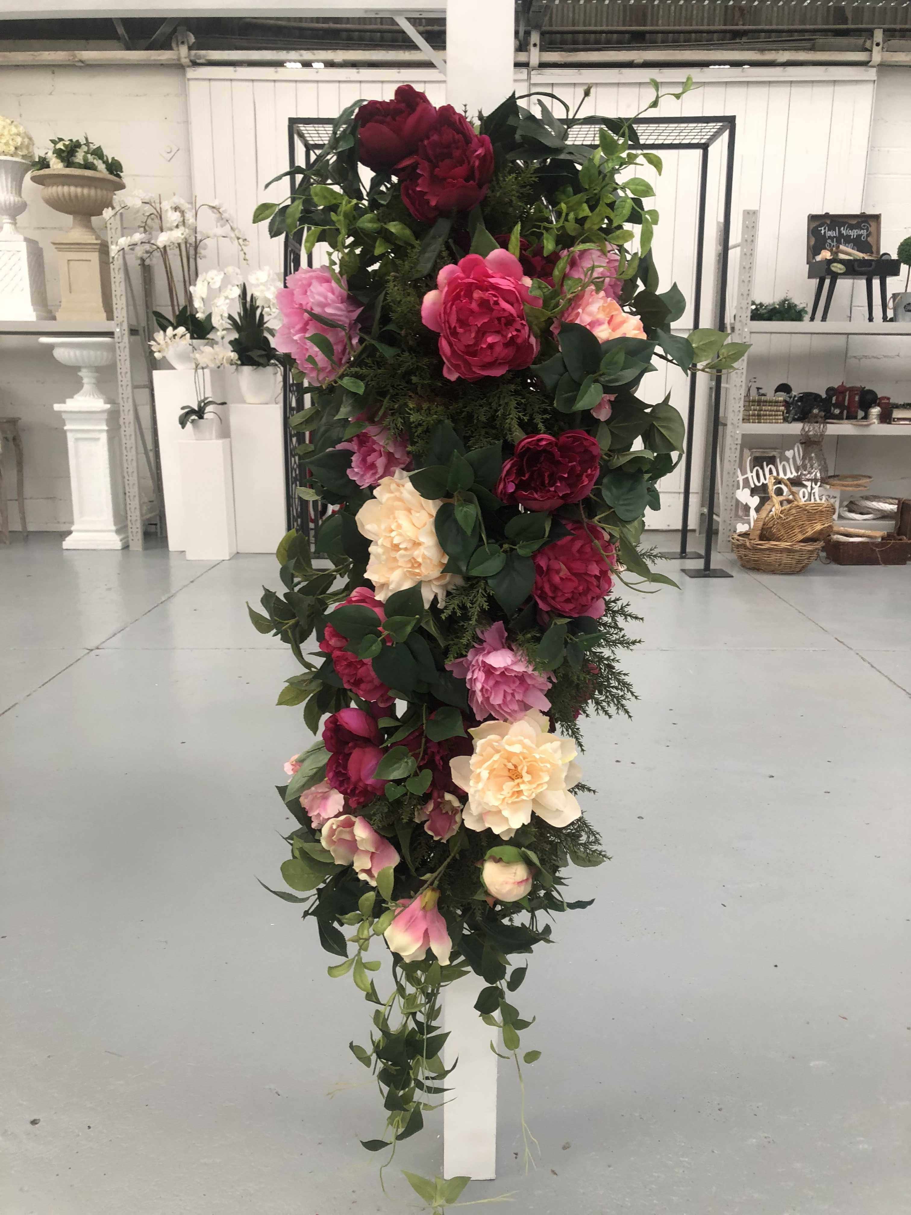 Silk pink and deep burgundy floral arrangement Weddings Of Distinction